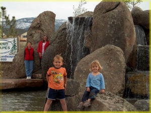 Belgrade Montana kids in a Waterfall